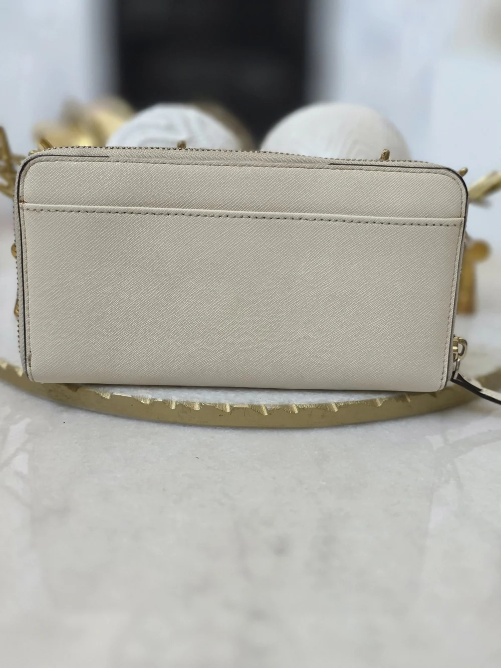 Kate Spade Newbury Lane Neda Zip Around Wallet in Cream Saffiano Leather.